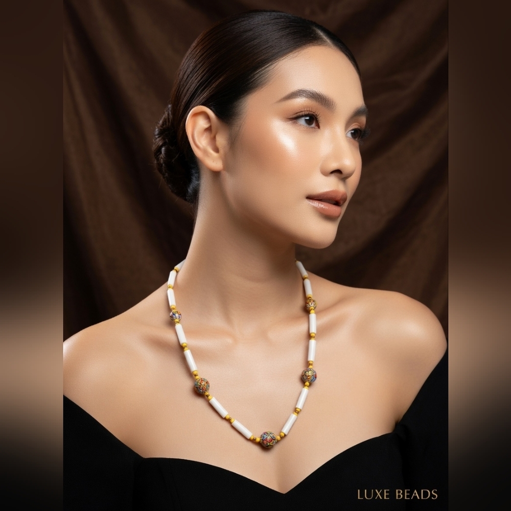 Handcrafted White and Gold Bead Necklace with Decorative Accent Beads
